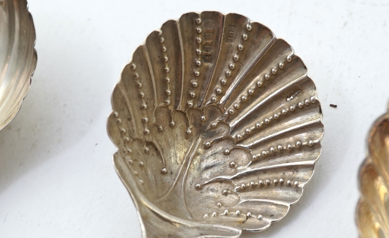 Ten assorted 19th and 20th century silver caddy spoons, with shell or fluted bowls